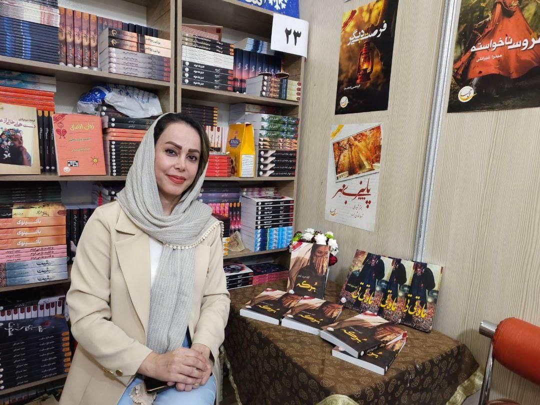 حضور بانوی نویسنده انزلیچی در نمایشگاه کتاب تهران